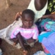 Donated jumpers for children in Uganda