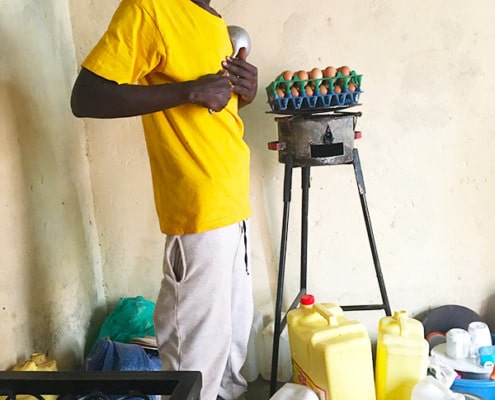 One of our boys making chapatis