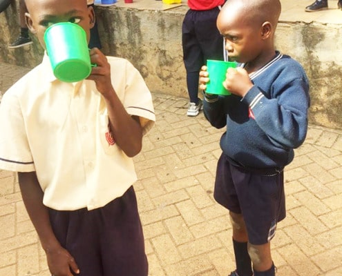 Porridge for school lunch in Kampala