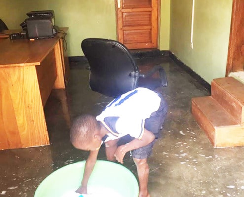 A street child learning to clean