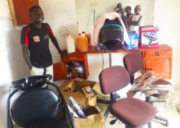 Former street boy with his own hairdressing business