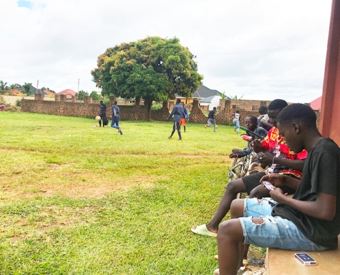 Our boys playing football in the field