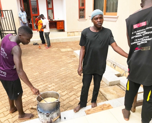 Former street boys cooking at George's Place