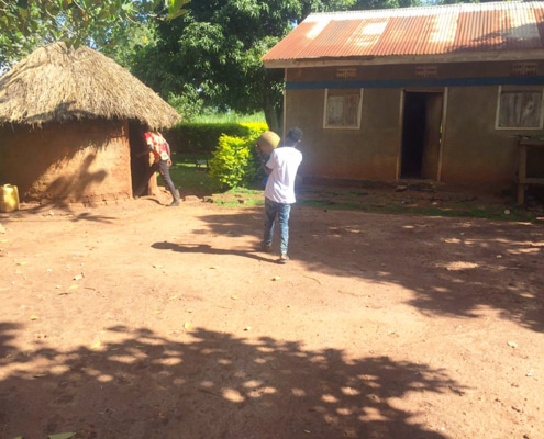 One of our boys returning to his village in Uganda