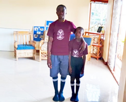 Two former street children at their new home