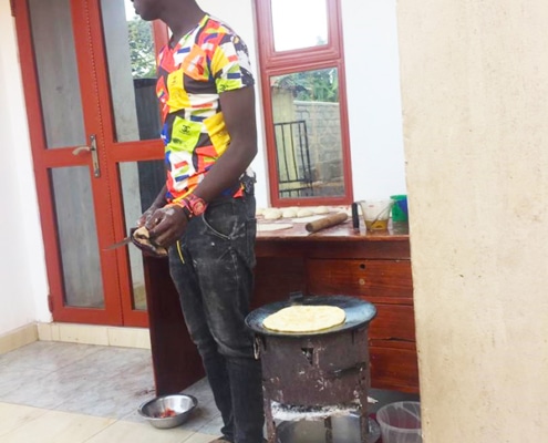 One of our boys cooking Chapatis