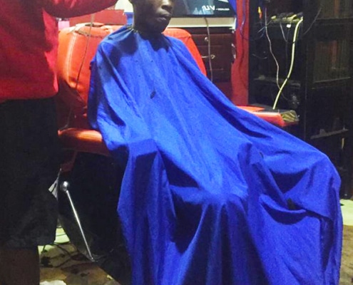At a barbers in Uganda