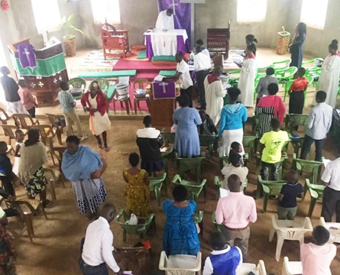 Attending St Michael’s church in Uganda