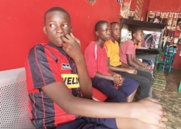 Fomer street boys having their haircuts