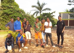 Two charity workers with some of our boys