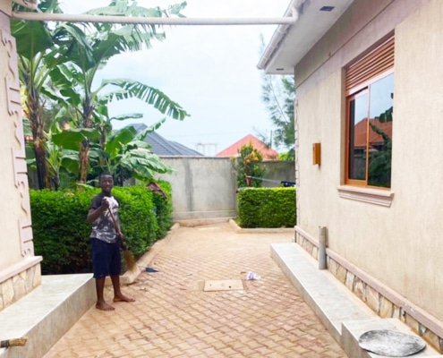 Boy cleaning at our charity