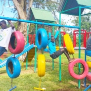 Street children in Uganda playing together at George's Place