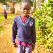 One of our boys going to school