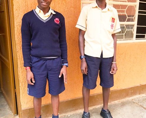 Two former street children now at school