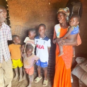 One of our boys with his family in Kayunga