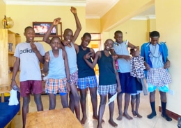 Former street children in new donated clothes