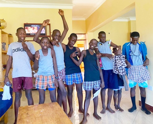 Former street children in new donated clothes