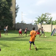 Former street boys playing football