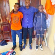 Former street children in donated trainers