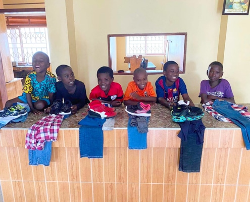 New clothes for former street boys and DRC refugee children