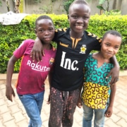 Two of our boys with a refugee child from Congo