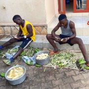 Former street children preparing dinner
