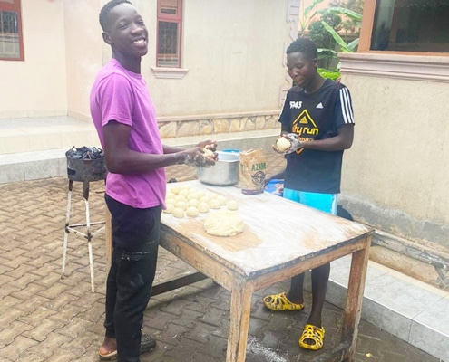 Former street children making chapatis
