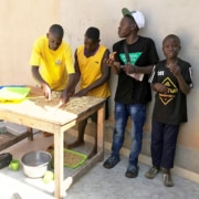 Former street children making snacks