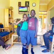 Two former street children returning from school