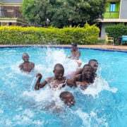 Boys playing in the pool