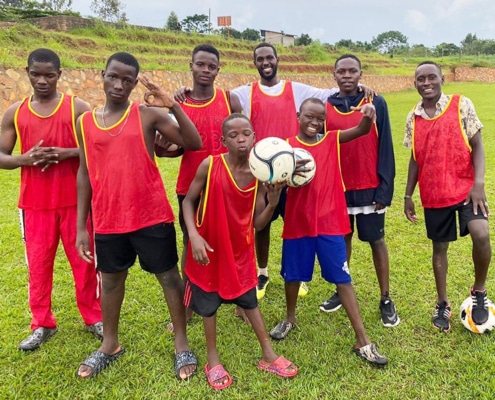 Former street boys football team in red