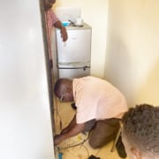 The charity fridge being repaired