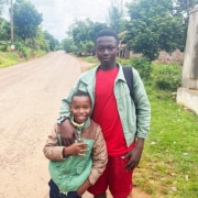 Our refugee boy and a former street child from Kampala