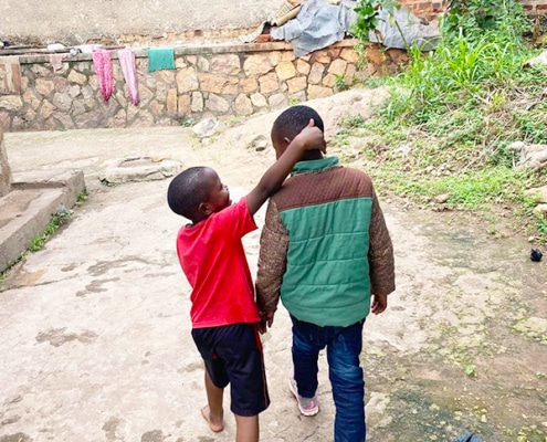 Two young refugee brothers from DRC