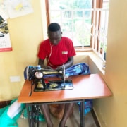 A former street child now making clothes