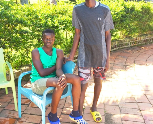 Two former street children now growing up
