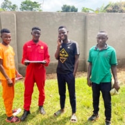 Four former street boys now at college