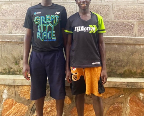 Two former street children at George's Place