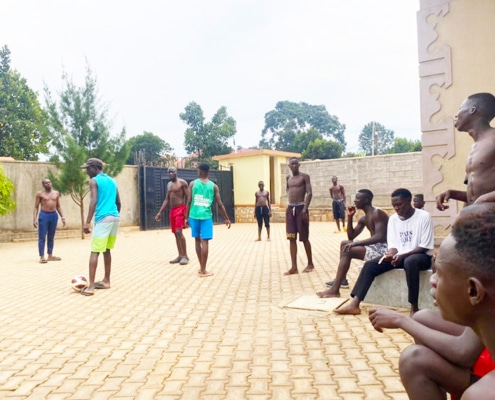 Boys waiting for Jane to return to Uganda
