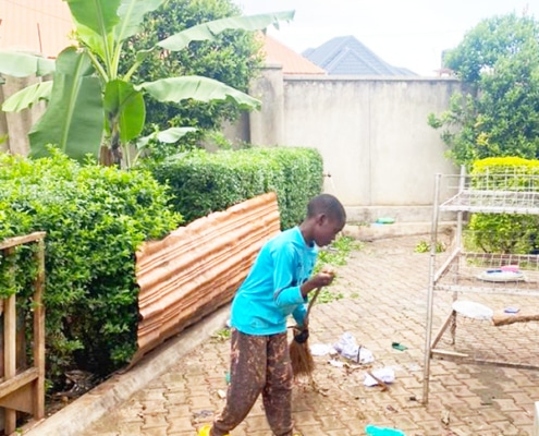 Former street child busy cleaning