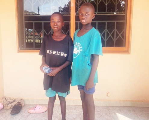 Two street children return to the charity
