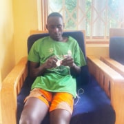 A street child from Kampala now crocheting
