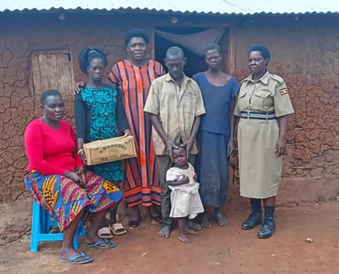 Charity worker visiting a family with the police