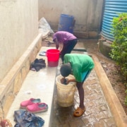 Former street children washing clothes