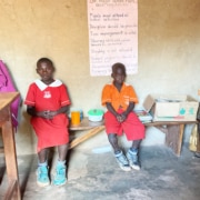 Two children at school in Kayunga, Uganda