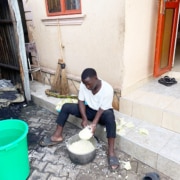 One of the boys preparing food