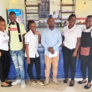 A former street boy now at work