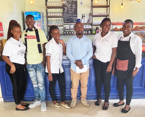 A former street boy now at work