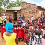 Giving donated items to school children