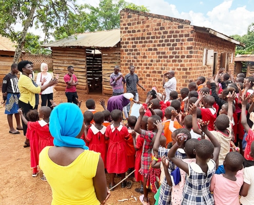 Giving donated items to school children